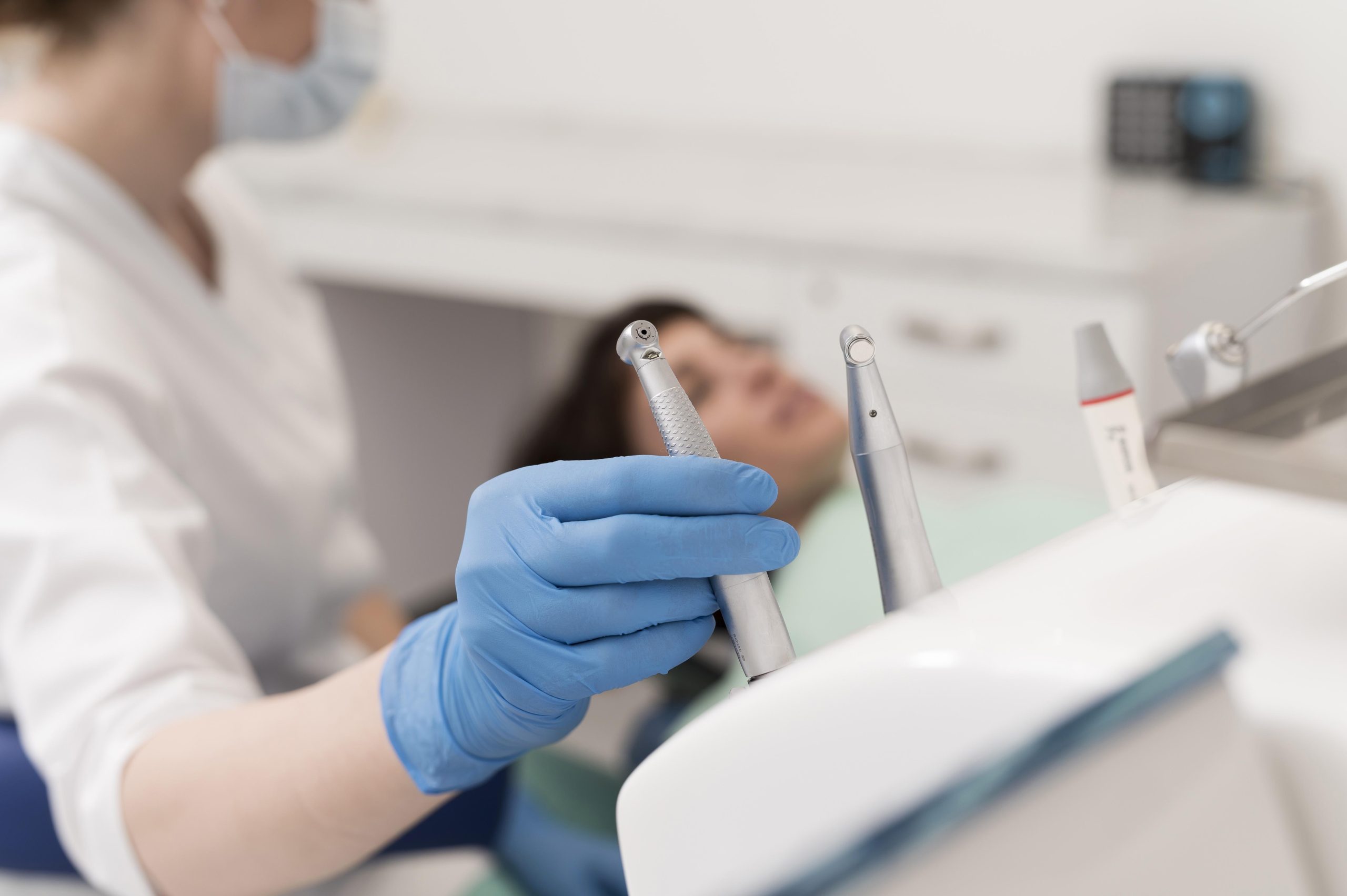 female-patient-having-procedure-done-dentist (1)